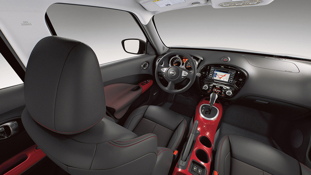 2017 Nissan JUKE SL interior shown in Red/Black Leather, highlighting NissanConnect navigation system